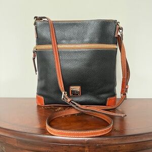 Dooney & Bourke, adjustable strap, can be used as a crossbody or shoulder bag